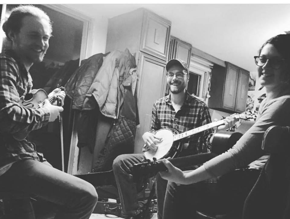 Black and white photo of the three members of The Flywheels bluegrass band