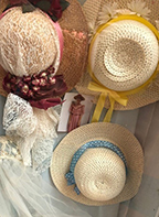 Photo showing three straw hats from Debra Abbey's hat collection Photo showing three straw hats from Debra Abbey's hat collection