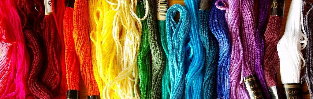 An array of colorful embroidery floss