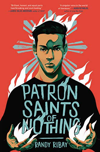 Illustration of a brown-skinned boy wearing a black tshirt on a red background. "Patron Saints of Nothing" is written in blue capital letters on the front of his t-shirt. He is lit from behind by white fire and beams of light and holds white flames in his hands.