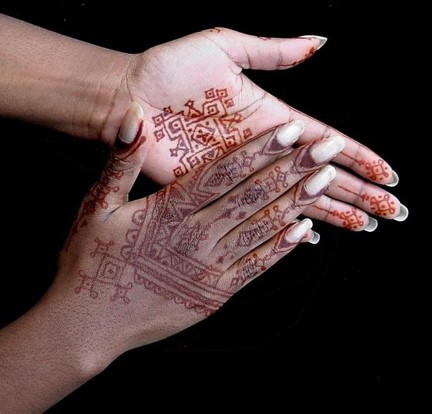 hands with henna decoration