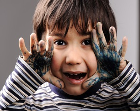 child with paint