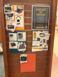 The Library of Things display with cards of items available for checkout