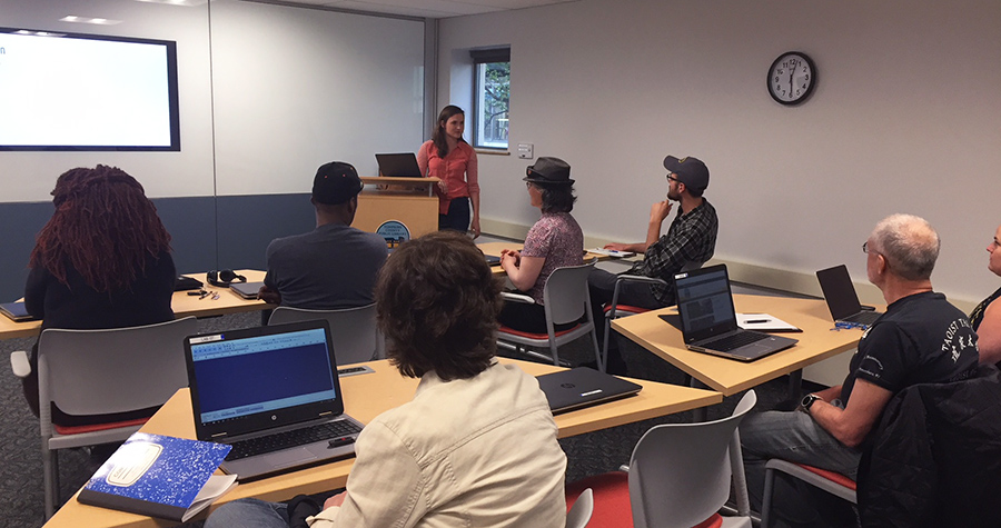 Image of podcast workshop attendees in digital lab