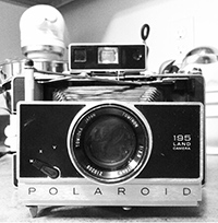 Black and white photo by Todd Ugine of vintage polaroid camera Black and white photo by Todd Ugine of vintage polaroid camera