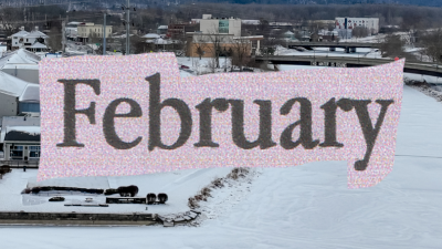 Text of the word February over a picture of a frozen-over Cayuga Lake