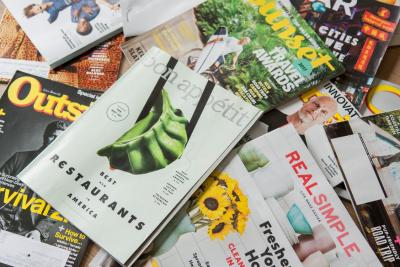A stack of various magazines