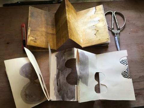 image of Amie Oliver origami journal work in progress with scissors