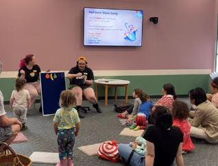 Photograph of a storytime in the Thaler/Howell Programming Room at Tompkins County Public Library