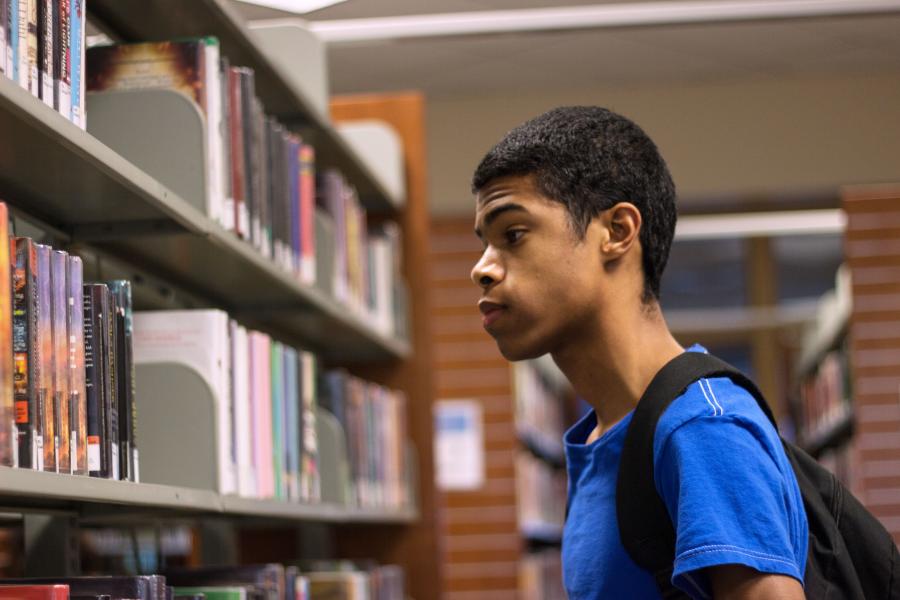 Teen in the stacks