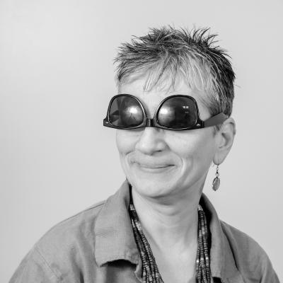 Photo of Kathy R wearing upsidedown sunglasses